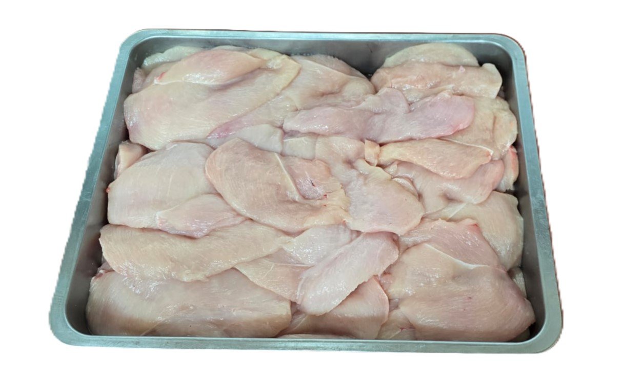 Fresh chicken breast at the butcher counter