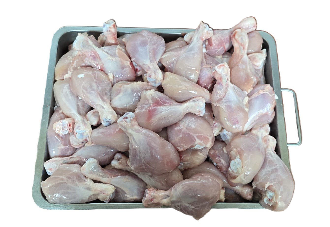 Fresh boneless chicken breasts in a butcher's tray
