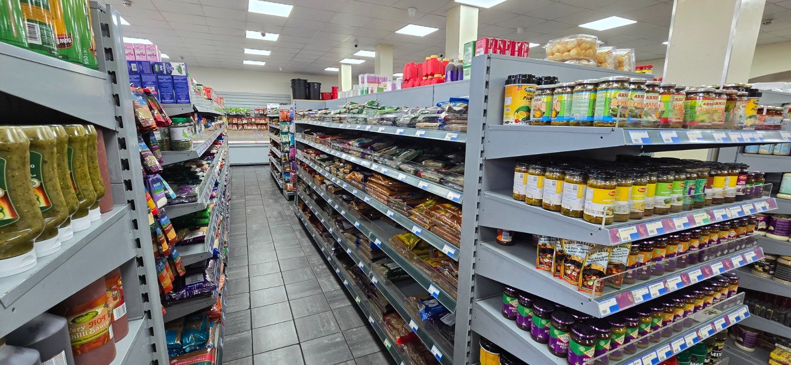 Asian and halal grocery aisle at NH Foods