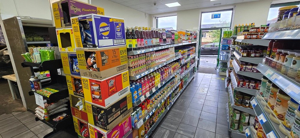 Snacks and confectionery aisle in store